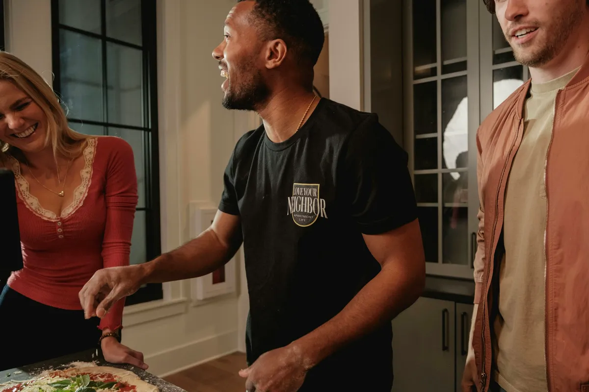 Friends making pizza at a supper club in Clinton Hill