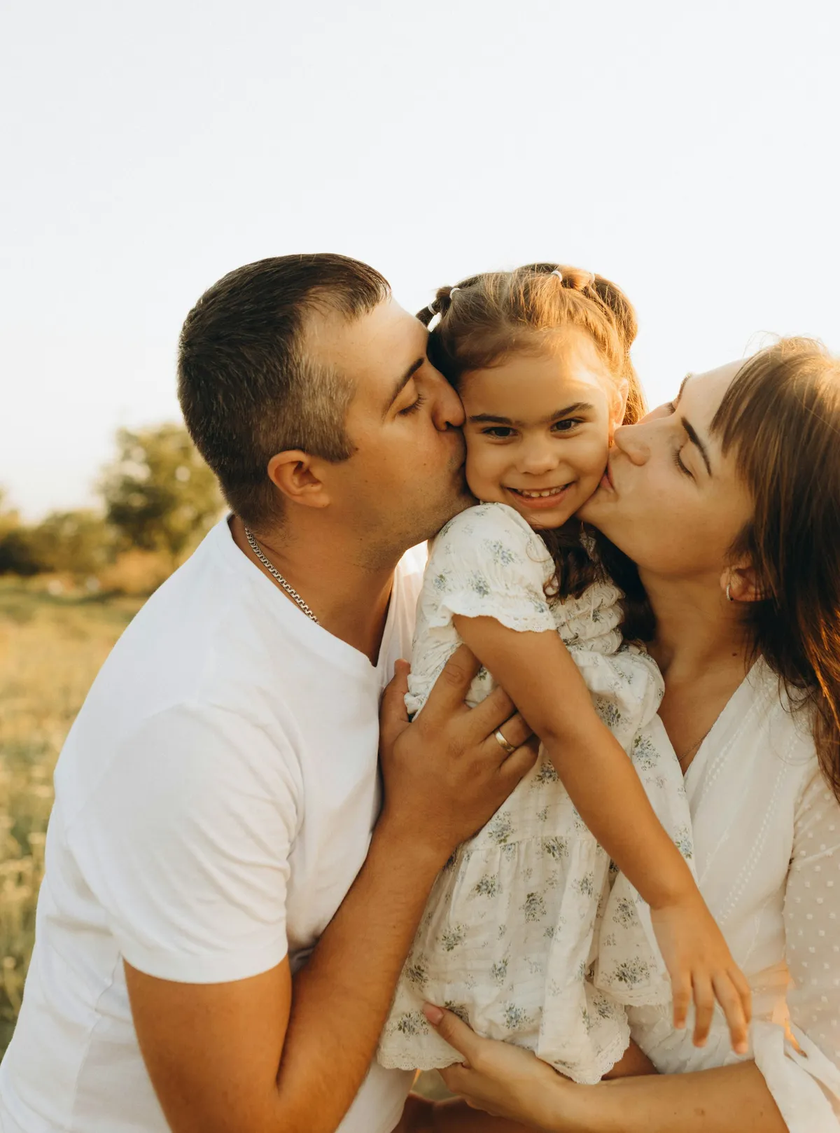 The Moreno family in the fields at sunset